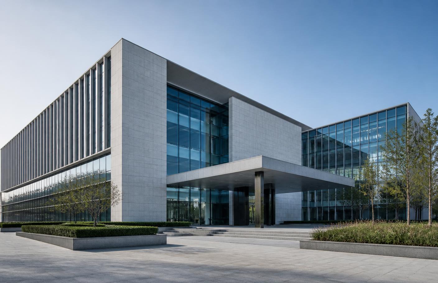 Modern government technology building with glass and stone facade